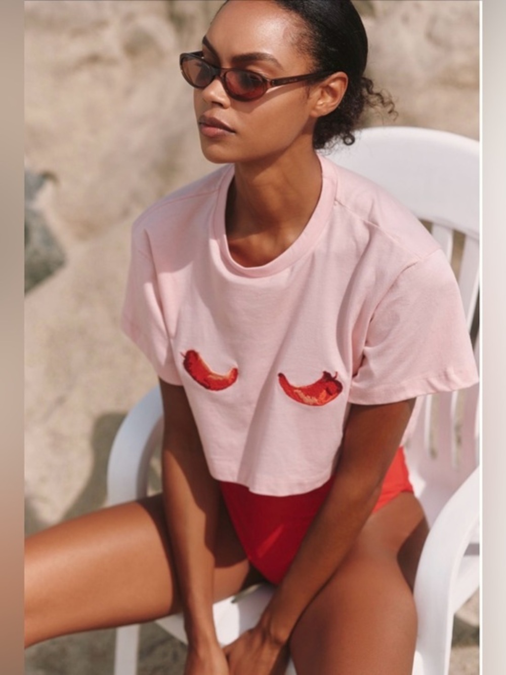 Anthropologie Pink Cropped Graphic Tee with Red Embroidered Detail